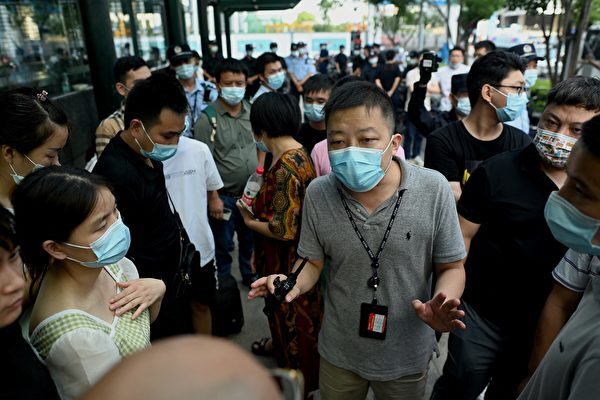 恒大集団、投資家「理財商品は詐欺だった」　各地で抗議活動