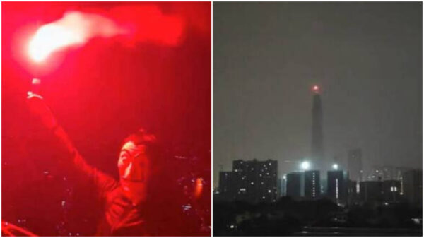 雷雨の高層ビル屋上に「反体制の仮面」　動画はすぐ削除＝中国